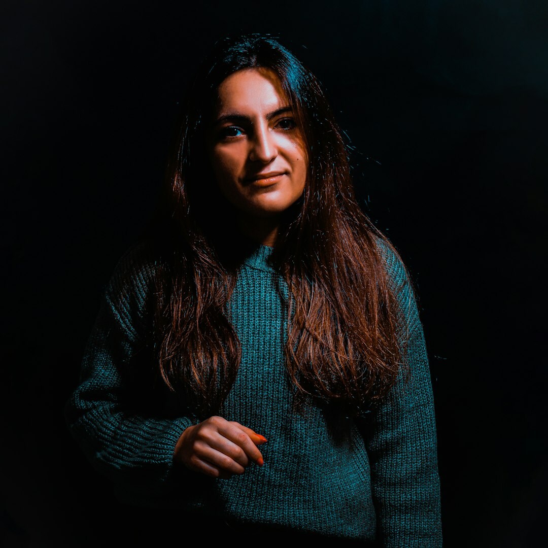 Portrait of a female photojournalism instructor smiling